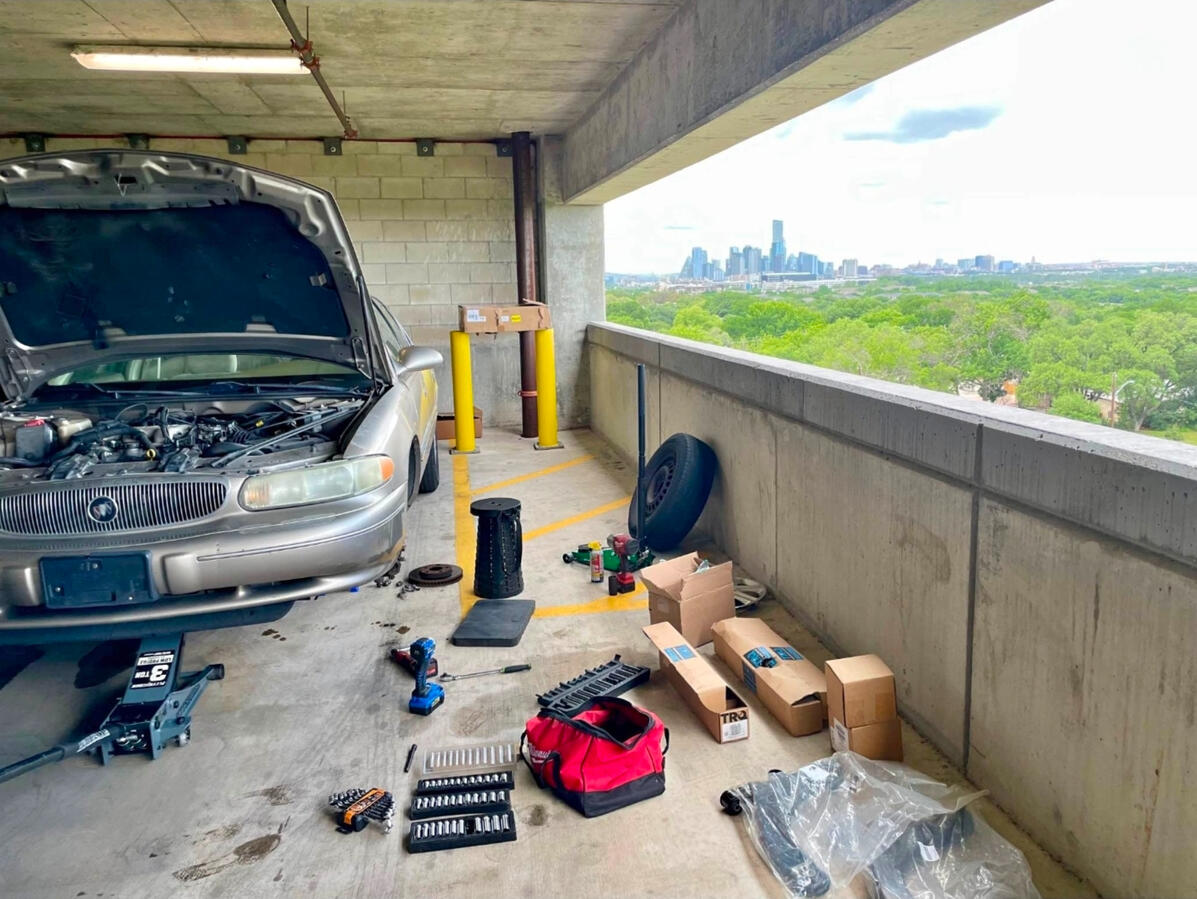 On-Site Mobile Repair β Downtown Fort Worth Mobile mechanic performing vehicle repairs in Fort Worth parking garage